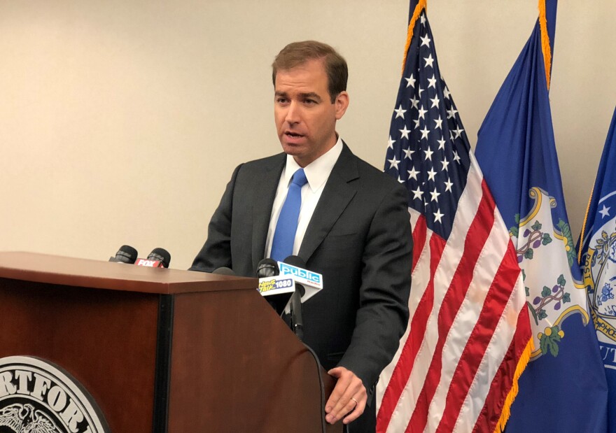 Hartford Mayor Luke Bronin addresses the media Thursday after the city released internal affairs reports on Stephen Barone.