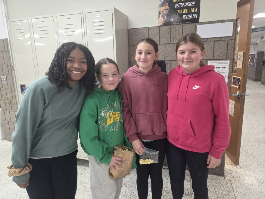 Sixth graders Charlotte Buckholtz, Kinley Haldeman, Elsie Jurgens and Ireland Daley say they would like to see a new gym at Nevis Public School on Oct. 27, 2026.