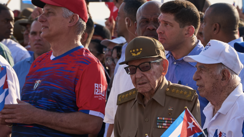 Raúl Castro (center, in green fatigues) at an international workers day celebration in Havana on May 1, 2026, with Cuban President Miguel Díaz-Canel (to Castro's right).