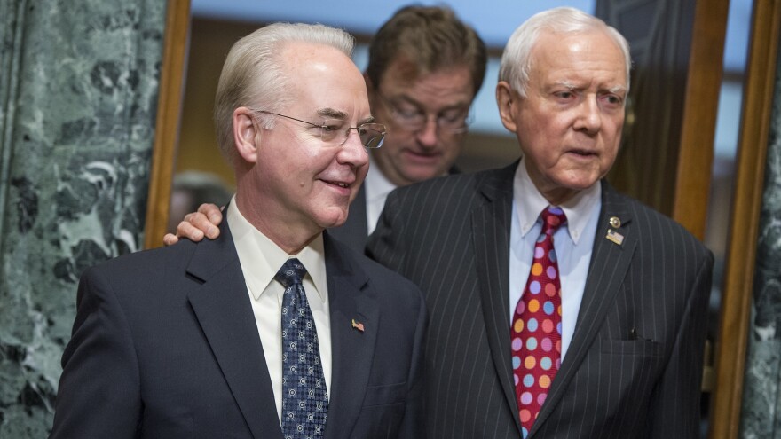 Rep. Tom Price, R-Ga., center, nominee for Health and Human Services secretary, is seen with Chairman Orrin Hatch, R-Utah, before his Senate Finance Committee confirmation hearing on Jan. 24.