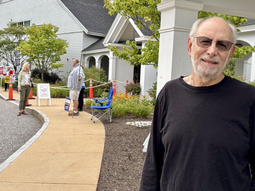 A Gilford voter outside the polls on NH primary election day Sept. 8