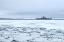 A ferry on an icy lake