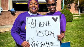 Kaiser workers Shannon Jones (right) and Patricia Johnson Gibson on the picket lines in Denver on October 4, 2023. They walked off the job for a three-day strike in the name of better wages and improved patient care.