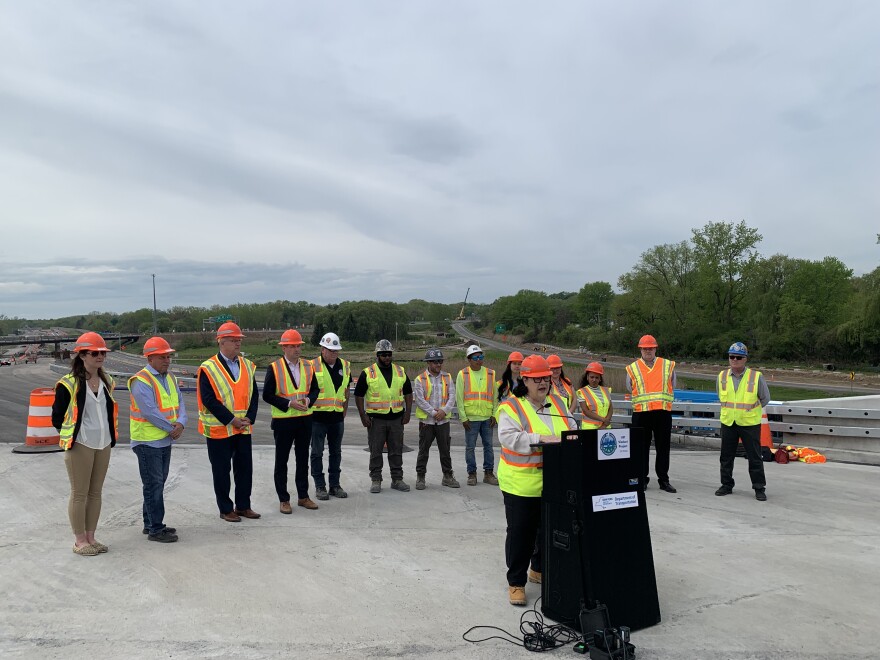 DOT Commissioner Marie Therese Dominguez addresses the media about the milestone of the completion for the I-81 flyover ramp in Cicero hours before it was officially opened to traffic.