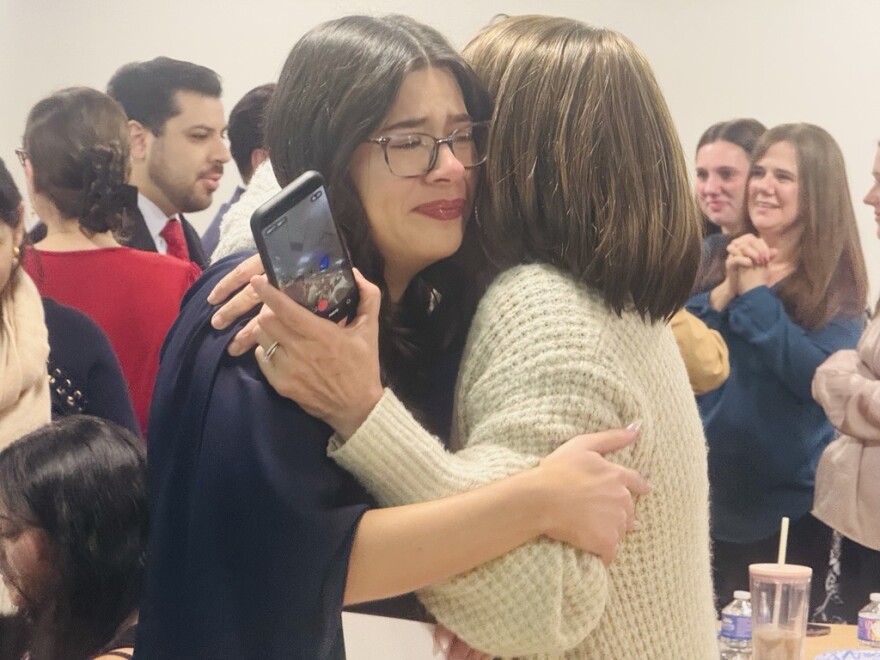 Gabrielle Bell embraces a loved one after learning she was matched with her first choice at LECOM and RRH's Match Day.