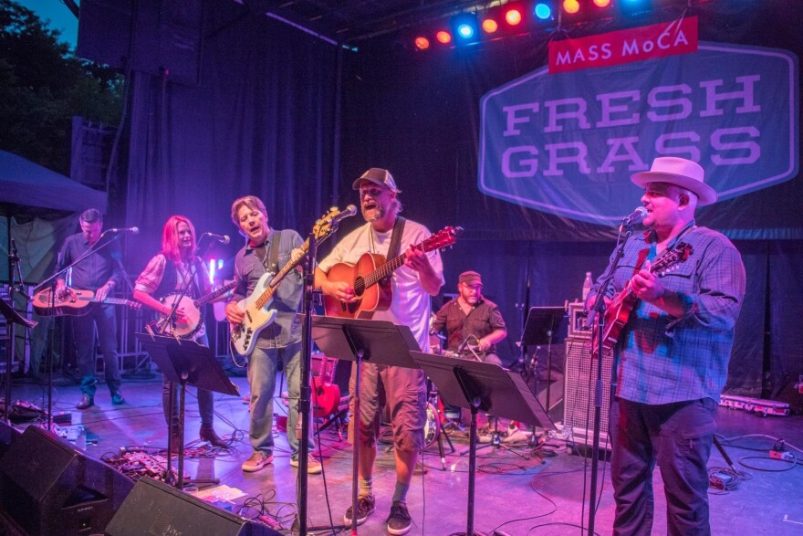 Chris Wadsworth, founder and director of the FreshGrass Foundation plays guitar with Rob Ickes, Alison Brown, Garry West and Frank Solivan at its seminal FressGrass Festival.