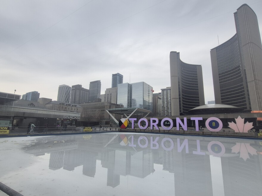 A wide shot of Downtown Toronto in front of city hall.