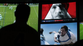 An ad featuring Conor McGregor plays on a screen at the Westgate Superbook sports book, Thursday, Aug. 24, 2017, in Las Vegas. (John Locher/AP)