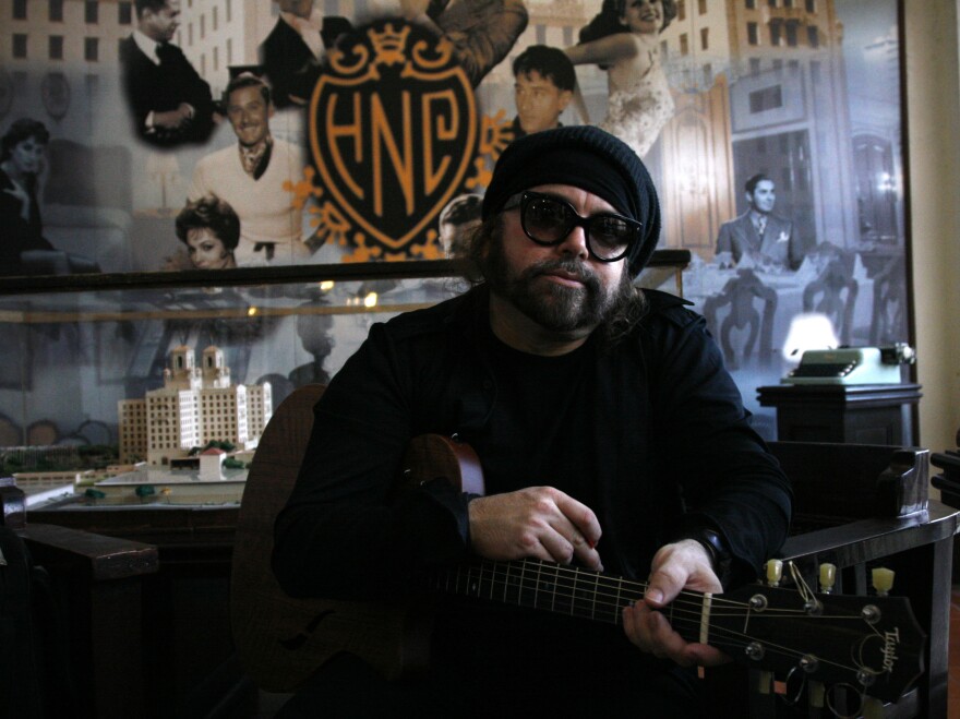 Carlos Varela, a Cuban protest singer, poses for a picture at the bar of the historic Hotel Nacional in Havana.