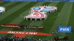 The teams of Russia and Saudi Arabia line up prior to their group A march which opens the 2018 soccer World Cup at the Luzhniki stadium in Moscow, Russia, Thursday, June 14, 2018. (Victor Caivano/AP)
