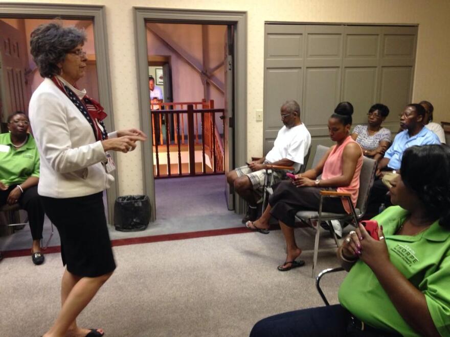 Alachua County Supervisor of Elections Pam Carpenter explains to supporters why voting results were delayed Tuesday night. Despite minor technical difficulties, the results were reported and gave some candidates the news they had been waiting for.