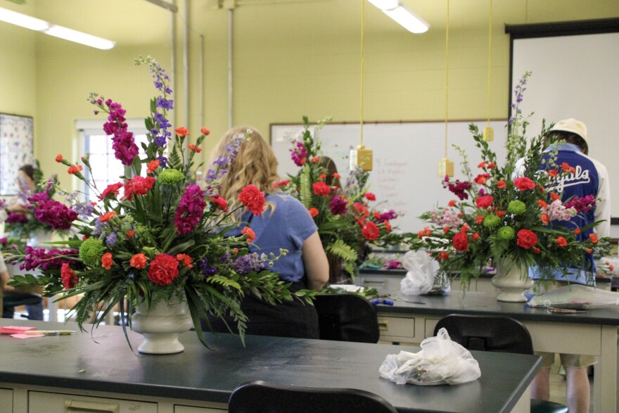 Students in the floral design program at Johnson County Community College get hands-experience during their class covering special events.