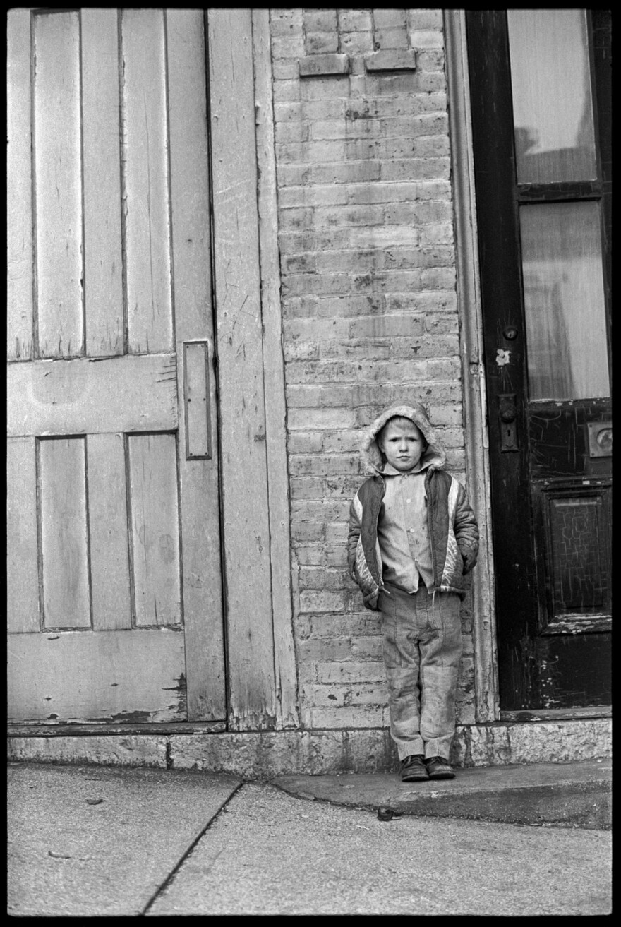 Another one of Demong's favorite photographs is a young boy outside