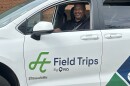 Image, man driving a vehicle labeled Field Trips