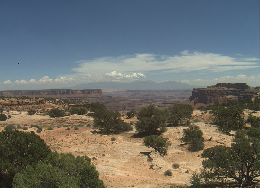 slightl smog over rolling desert landscape.