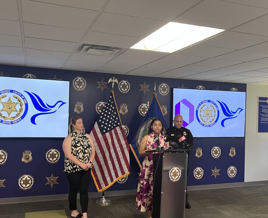 Members from the Osborne Association (center), Peaceprints of WNY (left) and the Erie County Sheriff's Office (right).