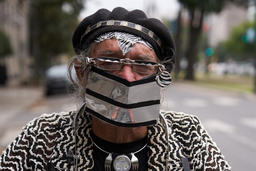 Clyde Casey is going out to get essential supplies. Casey is an artist and has started making woodcut signs that he is selling including one that say's "Quarantine and Chill." New Orleans, Louisiana. April 7, 2020.