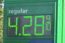 The sign at a gas station on Western Avenue in Peoria displays the price for regular gasoline as $4.28 and 9/10 cents per gallon on Tuesday, Sept. 1.