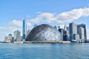 How big is the asteroid Apophis, which will pass by Earth in 2029? Well, it would fit neatly inside The Battery, a park at the tip of Manhattan in New York City. This image shows an artist's concept of Apophis in the park to illustrate its size in comparison to the rest of the New York City skyline.