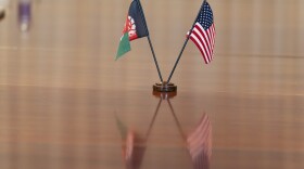 The flags of Afghanistan and the United States are seen on the table before a meeting between the Secretary of Defense Lloyd Austin and Afghan President Ashraf Ghani at the Pentagon in Washington, D.C., on June 25, 2021. (Alex Brandon/AP)