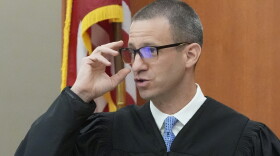 Third District Judge Judge Richard Mrazik looks on during a hearing for Kouri Richins, a Kamas mother of three who wrote a children's book about coping with grief after her husband's death and was later accused of fatally poisoning him Tuesday, Aug. 27, 2024, in Silver Summit.