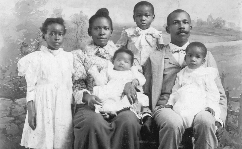 Casper George Garrett and Anna Marie Garrett, who are known in the book as Papa and Mama, are seen with four of their children, circa 1897.