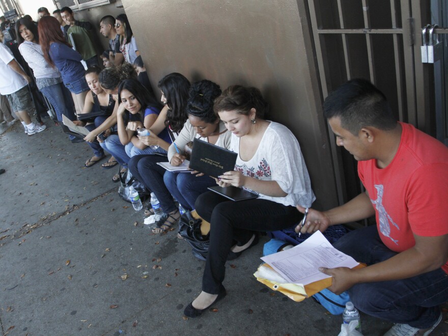 Crowd members seek help applying for the Deferred Action for Childhood Arrivals program at the Coalition for Humane Immigrant Rights of Los Angeles last August.