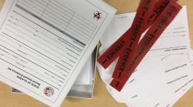 The sample collection tools inside a SART kit, which is used for sexual assault investigations. (Anne Hillman/Alaska Public Media)