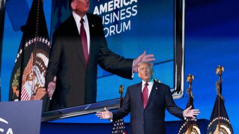 President Donald Trump arrives to speak to the America Business Forum Miami, at the Kaseya Center, Wednesday, Nov. 5, 2025, in Miami. (AP Photo/Jacquelyn Martin)