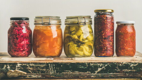 Fermenting and canning offer ways to preserve late-summer produce for use throughout the year. Beginners should start with small batches and follow tested food-safety instructions.