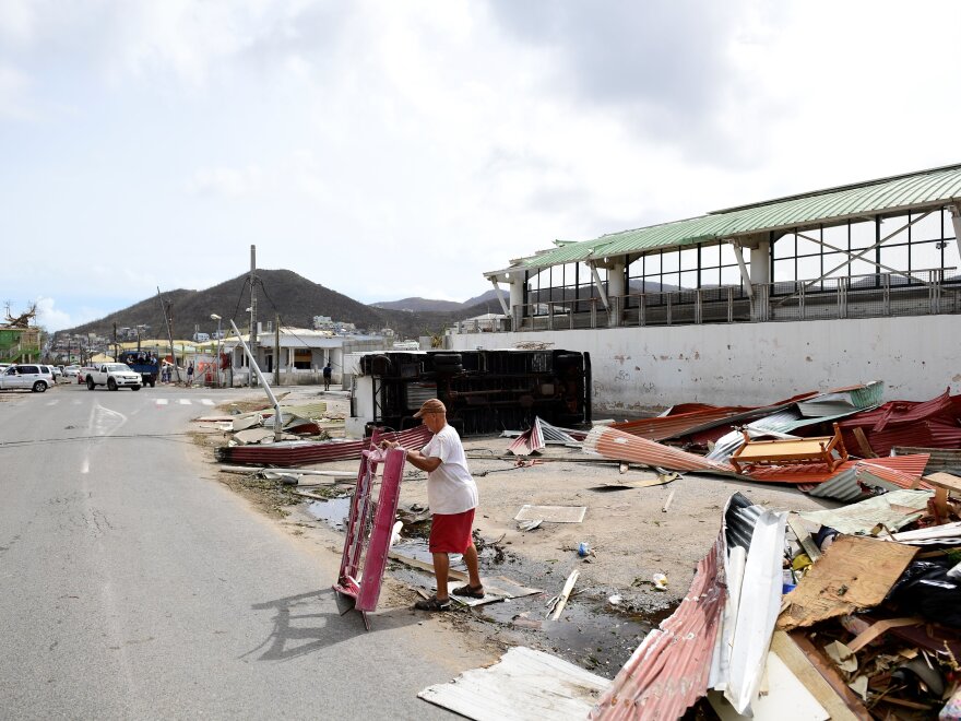 An overturned truck and other debris from Hurricane Irma are seen on St. Martin on Friday. The Caribbean island is one of those in danger of taking a second battering, from Hurricane Jose.