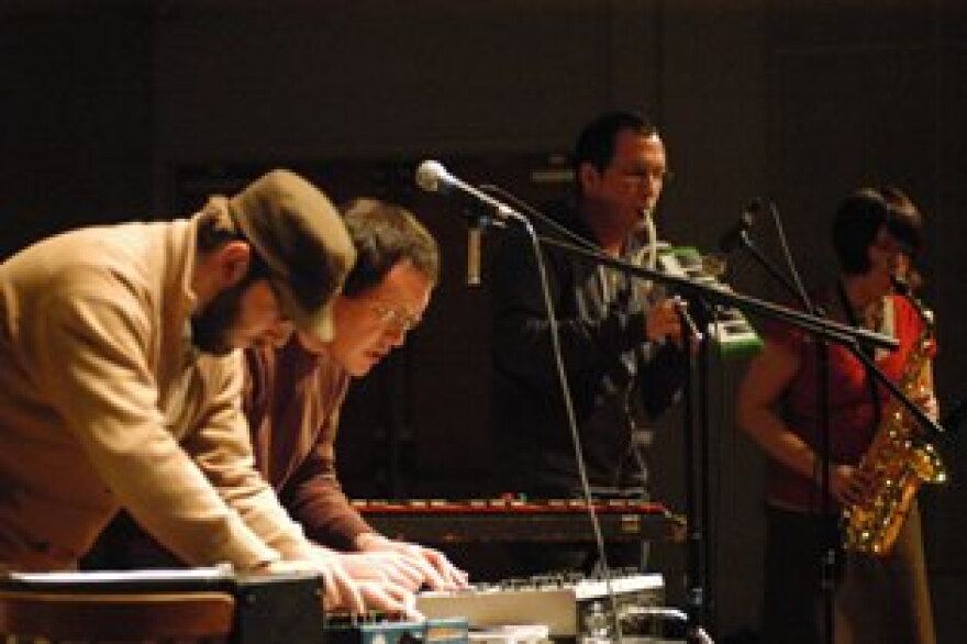 Joey McIntosh and Bill Fulton (foreground) hard at work with Ray Fulton and Nikki Downs as Sleeping Kings of Iona