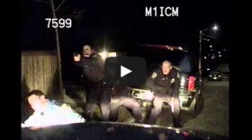 A snapshot of a video uploaded by Seattle Police to YouTube. The video is a police dash camera video. 
