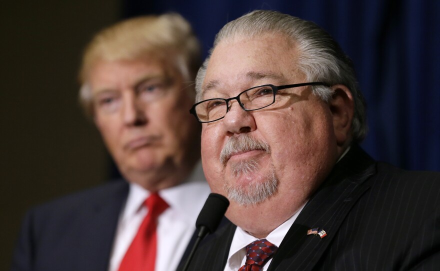 Sam Clovis speaks during a news conference with then-Republican presidential candidate Donald Trump in August 2016. Clovis announced on Thursday he would be withdrawing himself from consideration from a top post at the USDA.