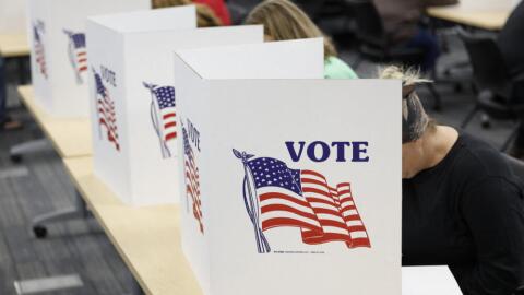 People cast their ballots on the last day of early voting for the general election in Michigan at the Livingston Educational Service Agency in Howell, Michigan on November 3, 2024. (Jeff Kowalsky/AFP via Getty Images)