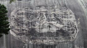 The 90-foot tall carving of Stonewall Jackson, Robert E. Lee and Jefferson Davis at Stone Mountain State Park in Georgia was completed in 1972. In recent years, activists have increased calls for the Confederate imagery to be removed.
