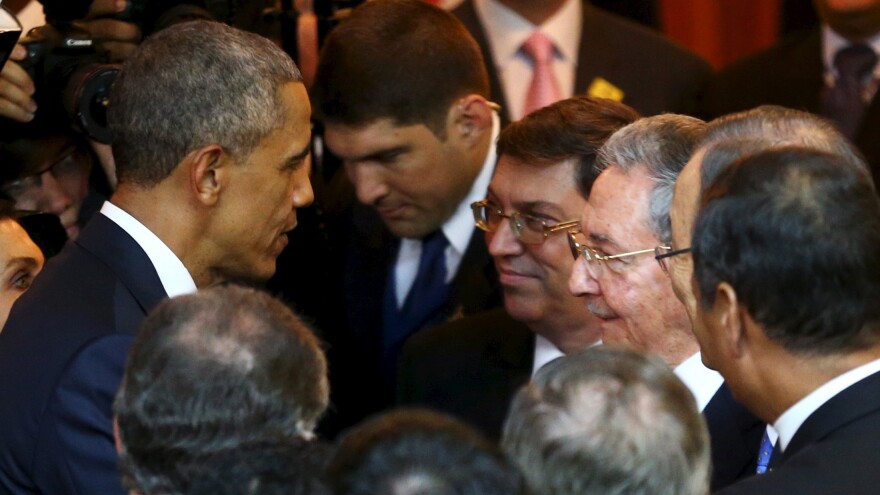 President Obama talks with Cuban counterpart Raul Castro before Friday's inauguration of the VII Summit of the Americas in Panama City.