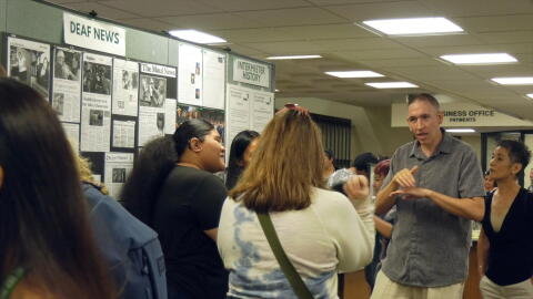 Members of Hawaiʻi’s Deaf community visit the new exhibit.