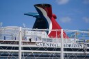 FILE - Carnival Cruise Line's Carnival Horizon cruise ship is shown docked at PortMiami, April 9, 2021, in Miami. (AP Photo/Wilfredo Lee, file)