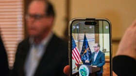 Gov. Mike Braun's initial state budget proposal includes nearly $700 million in tax relief, inflationary funding increases for K-12 schools and enough money to eliminate child care waitlists. It's built in part on Braun's pledge to cut $700 million in government spending.