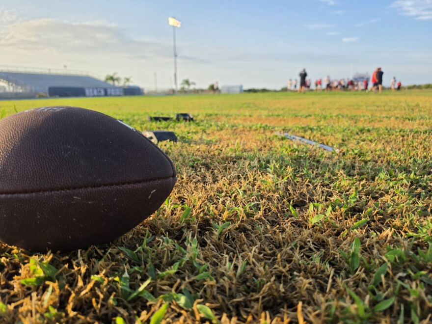 The Cocoa Beach Minutemen during an early morning practice. The team trains early twice a week to avoid the intense heat.