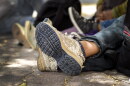 A family of asylum-seekers from Oaxaca, Mexico, waiting to enter the U.S. in 2018, near Brownsville, Texas. 