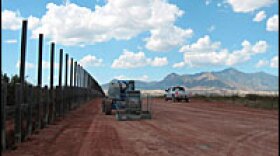 Construction of a fence along the Arizona-Mexico border has been halted near the San Pedro Riparian National Conservation Area, a major wildlife — and smuggling — corridor.