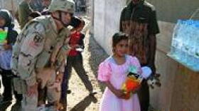 Major Brad Wenstrup during \"Operation Goodwill Gifts\"