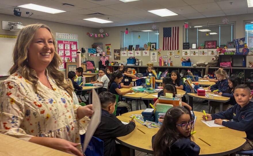 Elisabeth English smiles during a special visit from Arizona Schools Chief Tom Horne in February.
