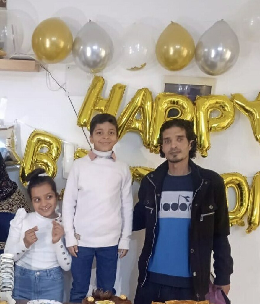 Eman Abusaeid's children, Joudi and Ziyad, and her husband, Iyad.