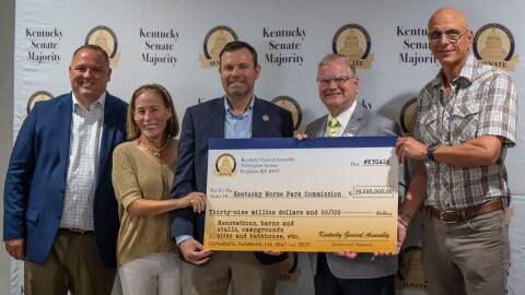 Senate Majority Floor Leader Damon Thayer and Sen. Steve West present a ceremonial check to Kentucky Horse Park President Lee Carter (left), Commission Chair Alston Kerr and Chairman of the Board of the Kentucky Horse Park Foundation Clay Green (right). The check represents $39 million allocated to the Kentucky Horse Park by the Kentucky General Assembly. May 21, 2024. Photo Credit: Kerry Howe, Marketing Director, Kentucky Horse Park.