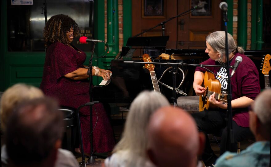 On July 10th, 2025 international recording and touring artists Lilli Lewis, Fox and Bear, and Paul Childers performed for a packed house of Pensacola music enthusiasts for the NPR broadcast of WUWF’s RadioLive held at the Pensacola Museum of Commerce the first Thursday of each month. Photo Credit Elizabeth Linn © all rights reserved