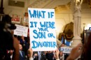 A sign at a 2018 Capitol rally in favor of opening a two-year window for civil lawsuits. (Commonwealth Media Services)