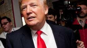 Donald Trump arrives at the Roundabout Diner in New Hampshire. Trump has questioned President Obama's status as a citizen of the U.S. He was answered this morning when the Obama administration released the President's birth certificate.